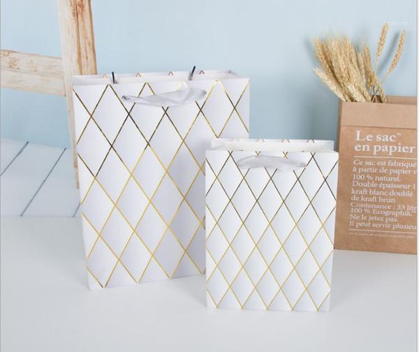 bronzing star gift paper bag, cothing white bags party wedding day christmas bags chocolate packagin gift 96pcs/lot1
bronzing star gift paper bag, cothing white bags party wedding day christmas bags chocolate packagin gift 96pcs/lot1