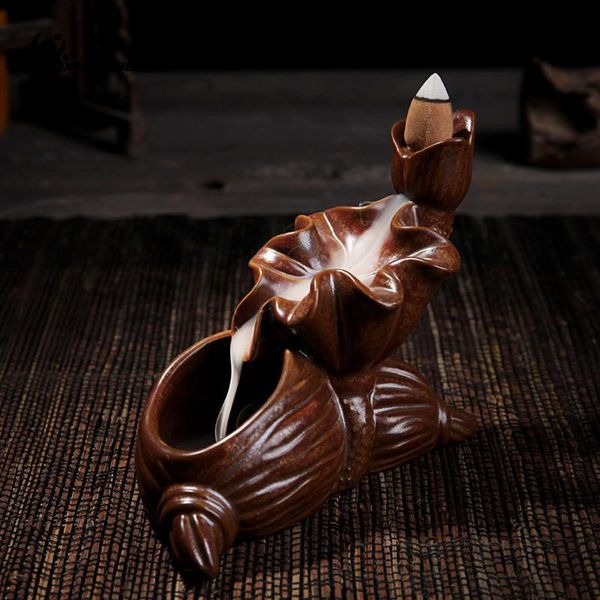 fragrance lamps ceramic smoke backflow tower incense burner conch shape lotus censer decoration
fragrance lamps ceramic smoke backflow tower incense burner conch shape lotus censer decoration