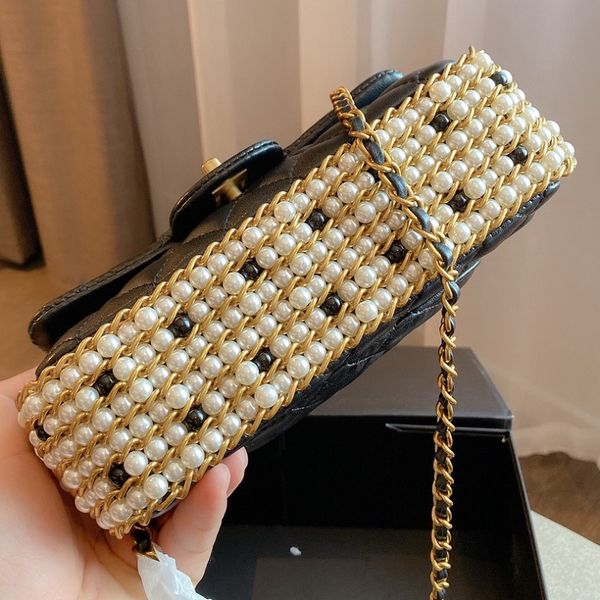 women luxurys designers bags 2020 pearl decoration shoulder bag handbag leather messenger bag two colors ing
women luxurys designers bags 2020 pearl decoration shoulder bag handbag leather messenger bag two colors ing