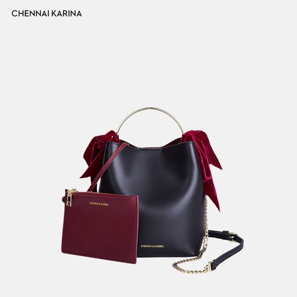 luxurys designers bow tie bucket 2021 summer new fashion women's korean hollow out iron hand carrying crossbody chain bag
luxurys designers bow tie bucket 2021 summer new fashion women's korean hollow out iron hand carrying crossbody chain bag