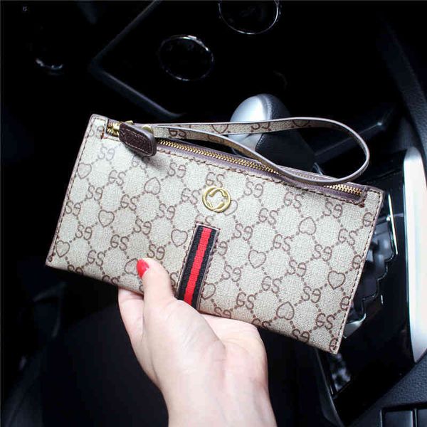 2022 factory wholesale fashion women's large capacity printed hand zero wallet mobile phone card bag, Red;black
2022 factory wholesale fashion women's large capacity printed hand zero wallet mobile phone card bag, Red;black