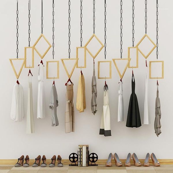 hooks & rails multifunctional hanger hanging on the wall of display rack in clothing store1
hooks & rails multifunctional hanger hanging on the wall of display rack in clothing store1