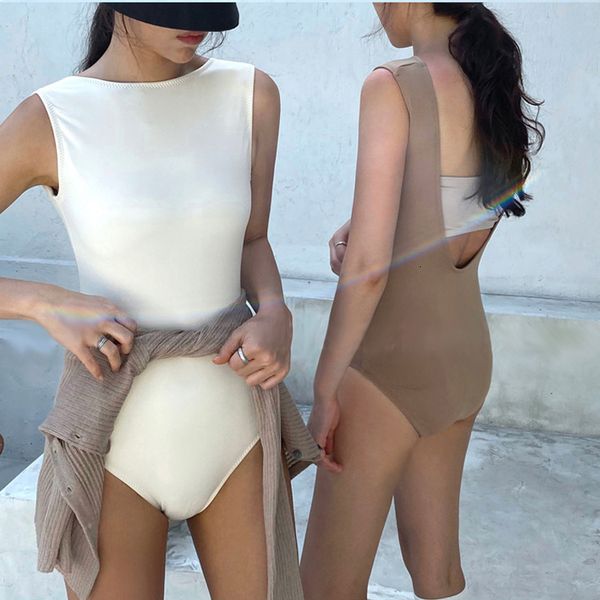 spanish new body shaping and repairing solid color one piece triangle bikini spring holiday beach girl swimsuit, White;black
spanish new body shaping and repairing solid color one piece triangle bikini spring holiday beach girl swimsuit, White;black