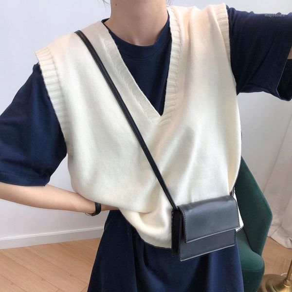 women's sleeveless v-neck knitted sweater vest casual loose office lady pullovers vests female 2020 autumn korean women sweaters1, Black;white
women's sleeveless v-neck knitted sweater vest casual loose office lady pullovers vests female 2020 autumn korean women sweaters1, Black;white