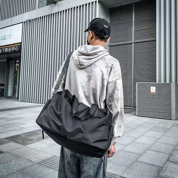 new luggage bag men's short distance portable travel bag women's multifunctional dry wet separation waterproof sports fitness bag8
new luggage bag men's short distance portable travel bag women's multifunctional dry wet separation waterproof sports fitness bag8