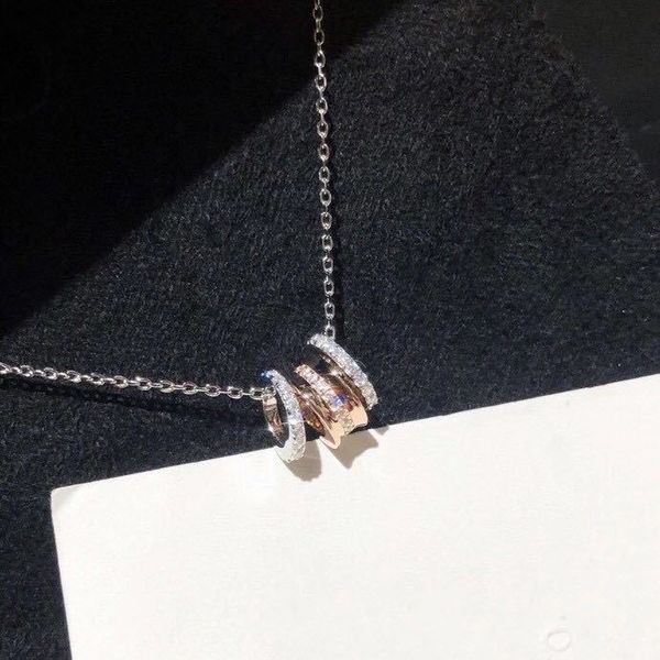 luxury carhome three-ring necklace 925 sterling silver two-color rose gold three-ring sanyuan pendant clavicle chain delivery factory wholes
luxury carhome three-ring necklace 925 sterling silver two-color rose gold three-ring sanyuan pendant clavicle chain delivery factory wholes