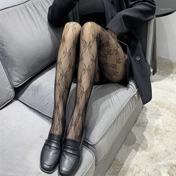 summer mesh stockings transparent slim bow fishnet pantyhose party club female lady net holes black white tights1
summer mesh stockings transparent slim bow fishnet pantyhose party club female lady net holes black white tights1