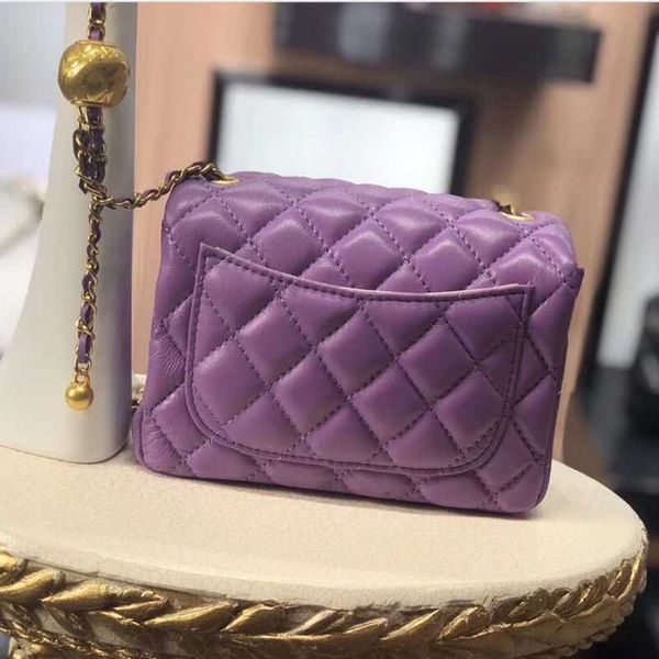 classic fashion sheepskin embroidery package round ball collocation to show the trend with a mobile phone zipper
classic fashion sheepskin embroidery package round ball collocation to show the trend with a mobile phone zipper