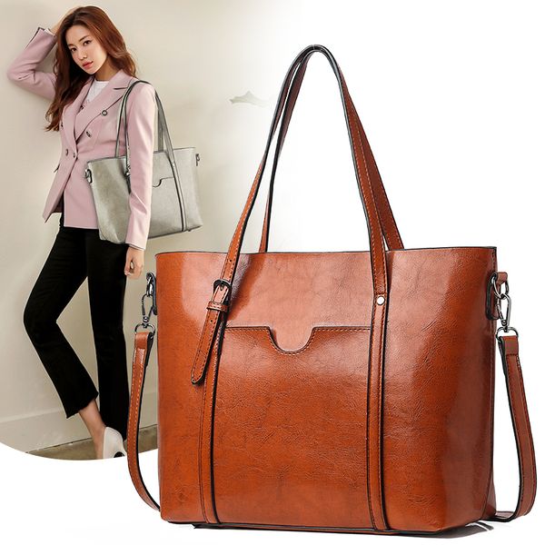 women's waxed leather, varnished female purse made of leather with handle postman screws tote bag
women's waxed leather, varnished female purse made of leather with handle postman screws tote bag