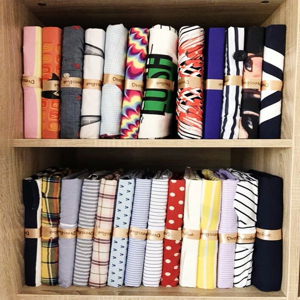 homehold clothes storage folders t - shirts folding organizer clothing folders for clean and tidy closet house
homehold clothes storage folders t - shirts folding organizer clothing folders for clean and tidy closet house