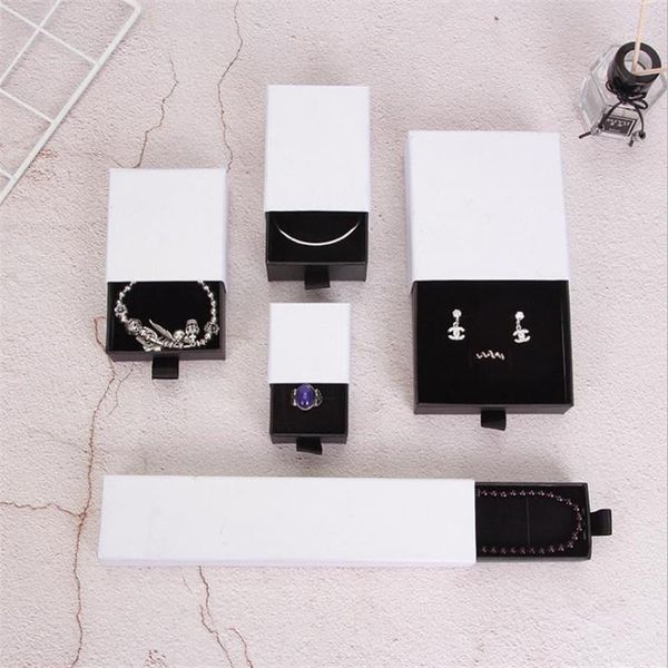 gift wrap 5pcs/lot white simple ring earring watch necklace small storage box black carton drawer jewelry portable blue gift1
gift wrap 5pcs/lot white simple ring earring watch necklace small storage box black carton drawer jewelry portable blue gift1