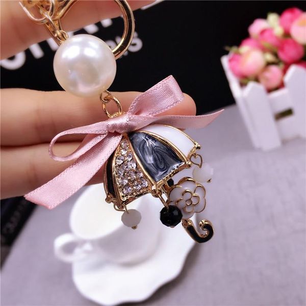 keychains cute crystal umbrella keychinas camellia bowknot bag accessories girl gift jewelry, Silver
keychains cute crystal umbrella keychinas camellia bowknot bag accessories girl gift jewelry, Silver