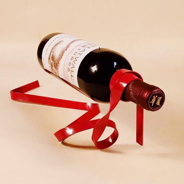 tablewine racks suspended ribbon shape iron bottle rack stand holder organizer home decoration interior crafts
tablewine racks suspended ribbon shape iron bottle rack stand holder organizer home decoration interior crafts