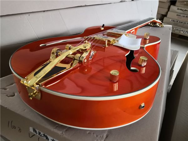 6120 6196 orange guitar,semi hollow body,2 switch,golden pickups ,hh pickups,bigsy tremolo
6120 6196 orange guitar,semi hollow body,2 switch,golden pickups ,hh pickups,bigsy tremolo