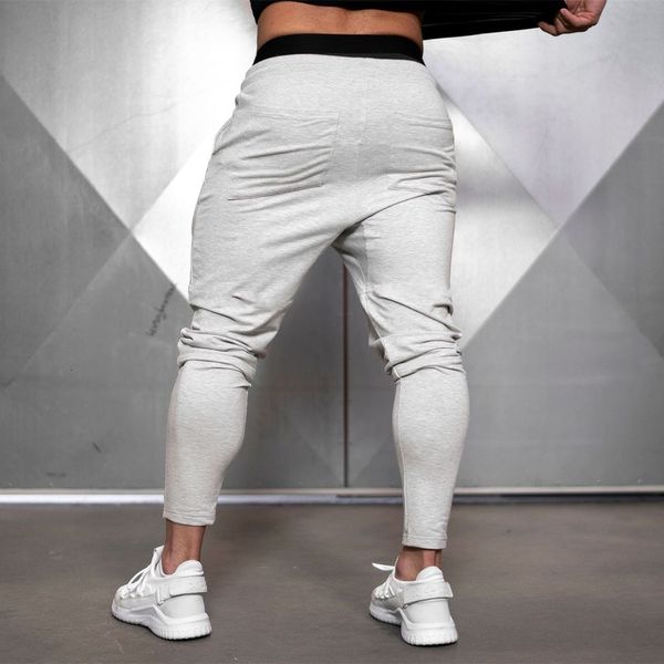 new 2021 solid gym sweatpants joggers men casual trousers male fitness sport workout cotton track pants spring autumn sportswear df03, Black
new 2021 solid gym sweatpants joggers men casual trousers male fitness sport workout cotton track pants spring autumn sportswear df03, Black