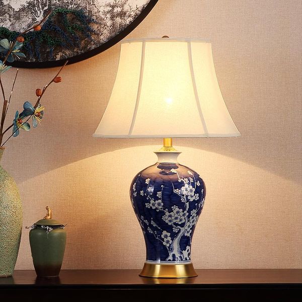 chinese classic conventional white plum on blue glazed table lamp made in jingdezhen
chinese classic conventional white plum on blue glazed table lamp made in jingdezhen