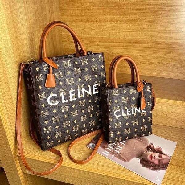 women's vertical arc de triomphe handbag 2020 new popular shoulder letter fashion simple tote bag
women's vertical arc de triomphe handbag 2020 new popular shoulder letter fashion simple tote bag