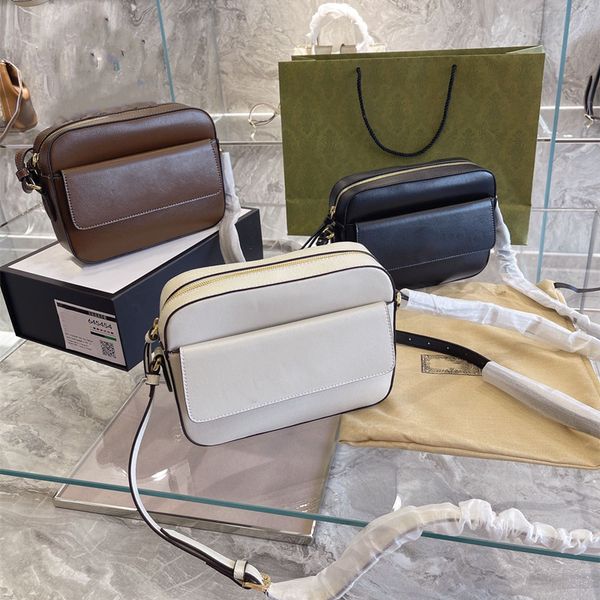 genuine leather 1955 women men tote g crossbody bags luxury designer woman fashion shopping evening camera pockets handbag shoulder bag
genuine leather 1955 women men tote g crossbody bags luxury designer woman fashion shopping evening camera pockets handbag shoulder bag
