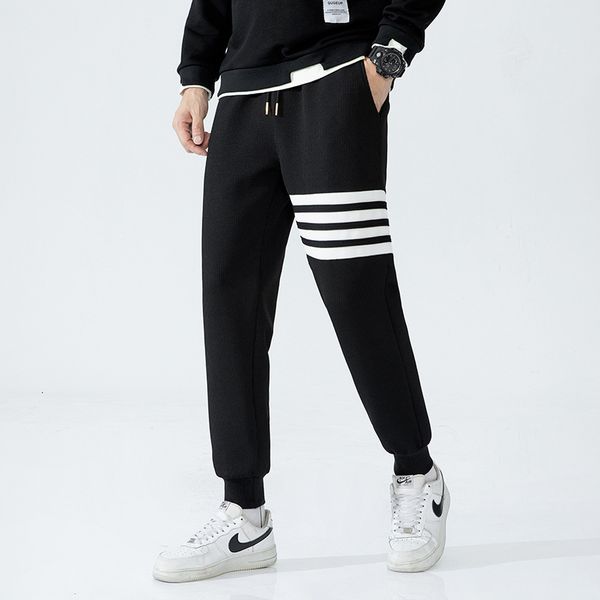 casual pants waffle men's autumn sports loose couple four bar small leg tb guard, Black
casual pants waffle men's autumn sports loose couple four bar small leg tb guard, Black