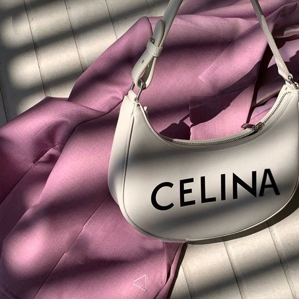 net red pea single shoulder underarm female fashion letter hand bag new trend
net red pea single shoulder underarm female fashion letter hand bag new trend