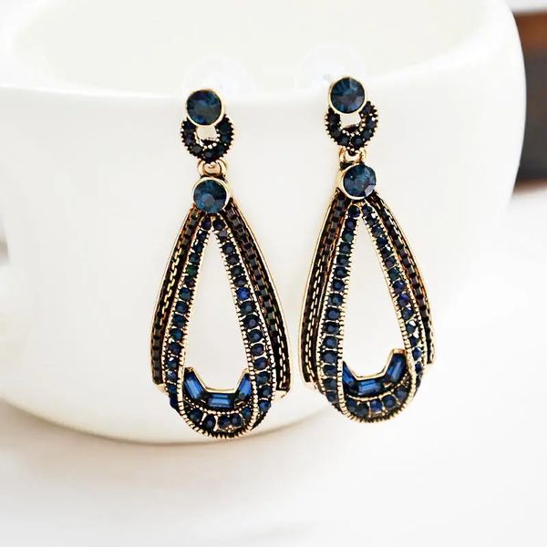 women's trendy rhinestones crystal hollow sapphire dangle gold drop shape earrings - blue, Silver 
women's trendy rhinestones crystal hollow sapphire dangle gold drop shape earrings - blue, Silver