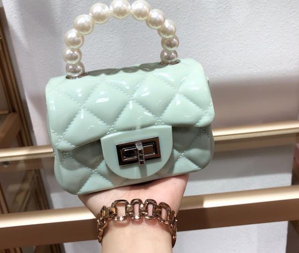 2021 spring and summer new mini jelly bag rhombic chain mini bag pearl handbag children bag small satchel
2021 spring and summer new mini jelly bag rhombic chain mini bag pearl handbag children bag small satchel