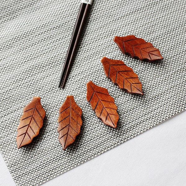 chopsticks 5pcs leaf shape wooden holder knife spoon rest stand fork rack frame art craft dinner tableware kitchen accessories
chopsticks 5pcs leaf shape wooden holder knife spoon rest stand fork rack frame art craft dinner tableware kitchen accessories
