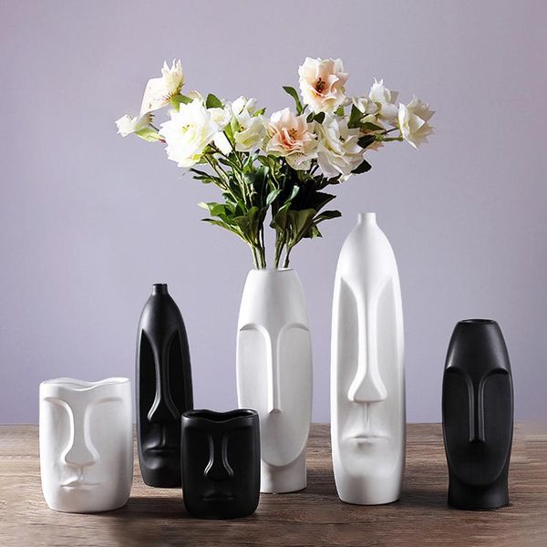 new creative white black avatar abstract human head art face ceramic vase modern living room flower shop decoration ornaments
new creative white black avatar abstract human head art face ceramic vase modern living room flower shop decoration ornaments