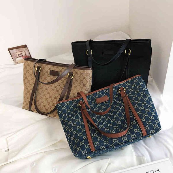 2022 factory outlet online big bag women's summer new korean atmospheric capacity one shoulder tote bag
2022 factory outlet online big bag women's summer new korean atmospheric capacity one shoulder tote bag