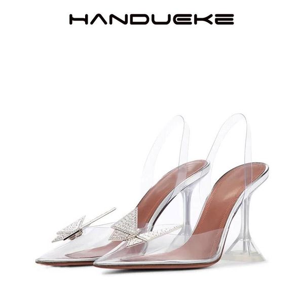 2021 new early spring pointed transparent sandals female baotou rhinestone bow tie wine glass with high heels, Black
2021 new early spring pointed transparent sandals female baotou rhinestone bow tie wine glass with high heels, Black