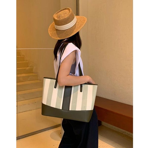 evening bags leather armpit bag canvas stripe large capacity tote shoulder handbag fashion female
evening bags leather armpit bag canvas stripe large capacity tote shoulder handbag fashion female