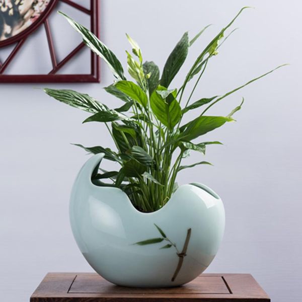 vases xin miao hydroponic non-porous pot ceramic large european creative personality simple crescent tong qian cao lotus basin
vases xin miao hydroponic non-porous pot ceramic large european creative personality simple crescent tong qian cao lotus basin