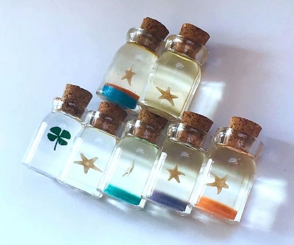 16 pcs fashion real starfish four leaf clover drifting bottle jewelry, Silver
16 pcs fashion real starfish four leaf clover drifting bottle jewelry, Silver