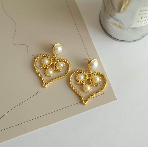 dangle & chandelier metal sylish exaggerated personality hollow twist love heart-shaped pearl earrings women luxury vintage advanced eardrop, Silver
dangle & chandelier metal sylish exaggerated personality hollow twist love heart-shaped pearl earrings women luxury vintage advanced eardrop, Silver
