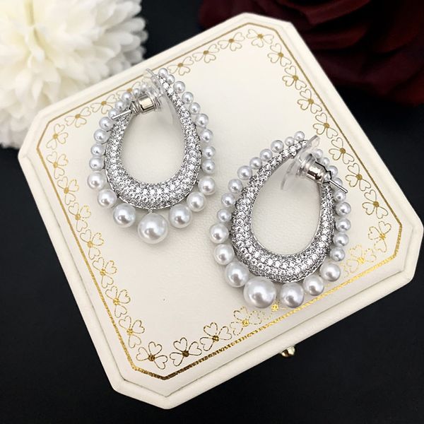 backs earrings pearl arc water drop shape light luxury personality fashion face thin dinner heavy industry s925 silver needle, White
backs earrings pearl arc water drop shape light luxury personality fashion face thin dinner heavy industry s925 silver needle, White