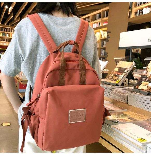 backpack 2021 orange waterproof nylon travel candy female school bag for girls mochilas casual rucksack college leisur letter
backpack 2021 orange waterproof nylon travel candy female school bag for girls mochilas casual rucksack college leisur letter