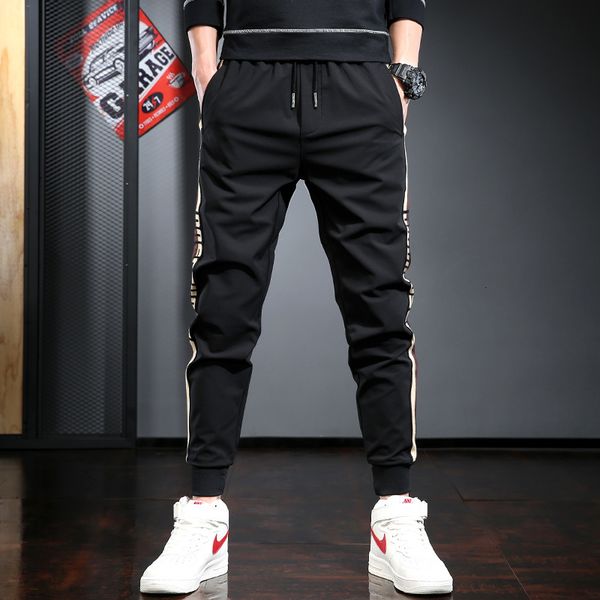 2021 esportivas moda masculina lado stripe joggers preto calas de cintura elstica sweatpants mgdg, Black
2021 esportivas moda masculina lado stripe joggers preto calas de cintura elstica sweatpants mgdg, Black