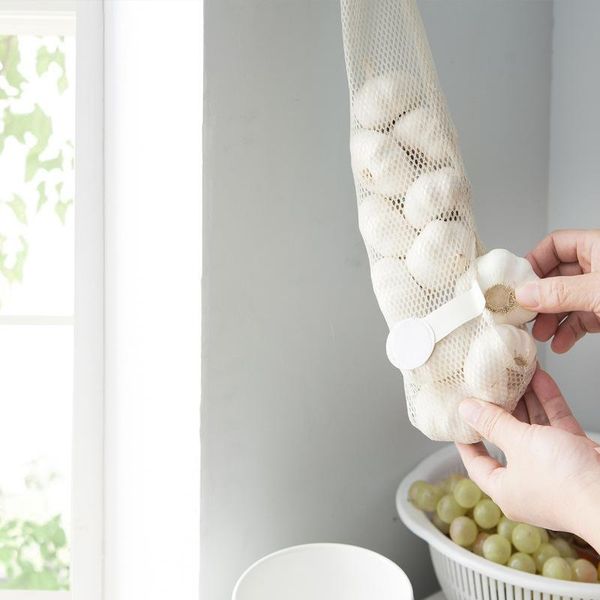 storage bags creative multifunctional kitchen fruit and vegetable mesh bag hanging hollow breathable garlic onion
storage bags creative multifunctional kitchen fruit and vegetable mesh bag hanging hollow breathable garlic onion