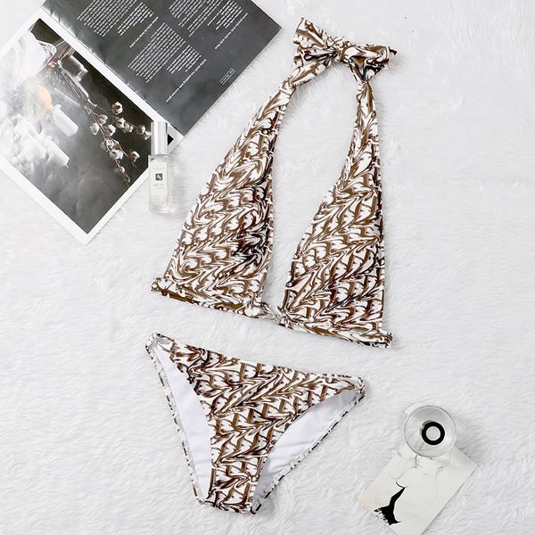 fashion brand d family letter bikini women's net red neck strap triangle holiday swimsuit, White;black
fashion brand d family letter bikini women's net red neck strap triangle holiday swimsuit, White;black