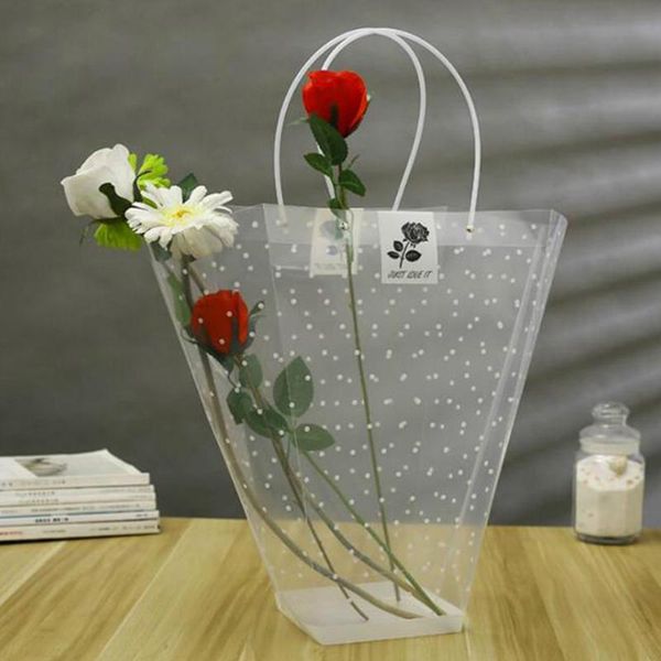 portable gift bag pvc flower packaging bag transparent polka dot wrapping plastic bouquet packing box carrier with handles
portable gift bag pvc flower packaging bag transparent polka dot wrapping plastic bouquet packing box carrier with handles
