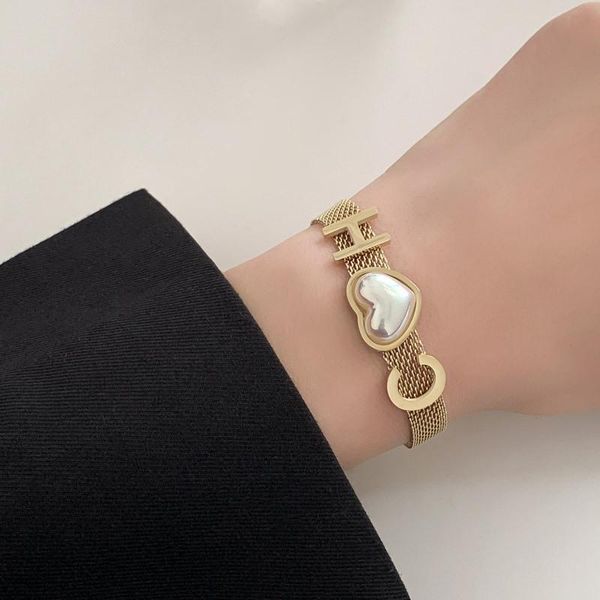 charm bracelets watch strap design does not fade, high sense of love pearl titanium steel bracelet women, Golden;silver
charm bracelets watch strap design does not fade, high sense of love pearl titanium steel bracelet women, Golden;silver