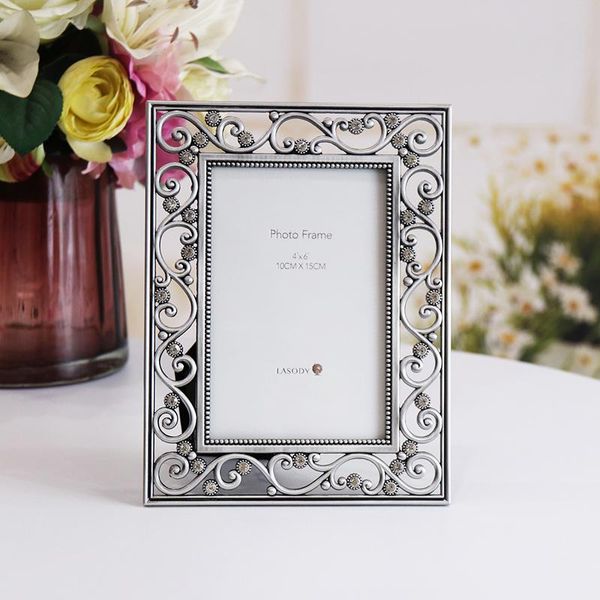 frames lasody wedding birthday commemorative gift metal rectangular po frame pattern hollow family portrait set 
frames lasody wedding birthday commemorative gift metal rectangular po frame pattern hollow family portrait set