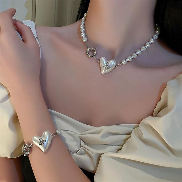 chokers luxury pearl heart pendant necklace bracelets beaded choker fashion elegant temperament clavicle chain jewelry for women girls, Golden;silver
chokers luxury pearl heart pendant necklace bracelets beaded choker fashion elegant temperament clavicle chain jewelry for women girls, Golden;silver