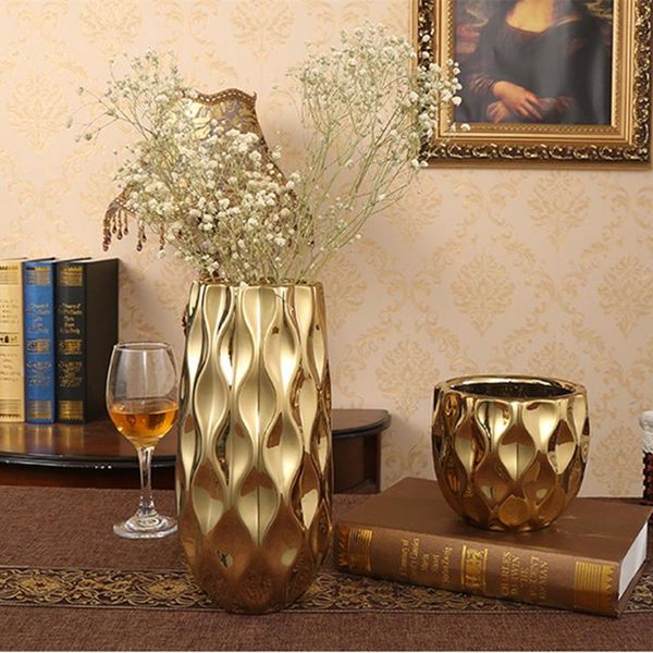 vases modern gold plating bumps stereol vase european big mouth high-grade flower bottle living room luxurious deskdecoration
vases modern gold plating bumps stereol vase european big mouth high-grade flower bottle living room luxurious deskdecoration