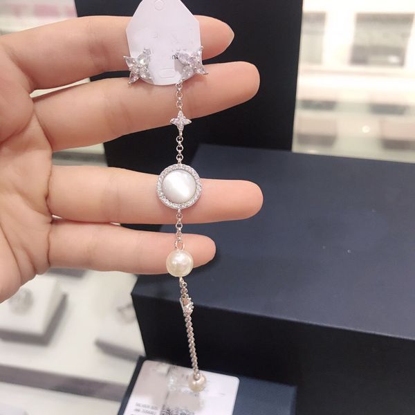 umgodly luxury brandasymmetry long chain star ab earrings with pearl cubic zirconia women fashion brand design jewellery, Silver
umgodly luxury brandasymmetry long chain star ab earrings with pearl cubic zirconia women fashion brand design jewellery, Silver