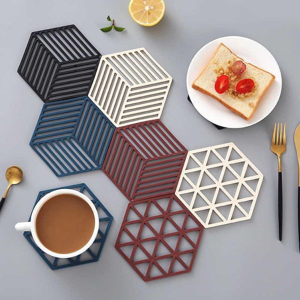 mats & pads nordic simple tableware pad anti scalding kitchen tool silicone material 14 * 7cm hexagon 2 styles and various color
mats & pads nordic simple tableware pad anti scalding kitchen tool silicone material 14 * 7cm hexagon 2 styles and various color