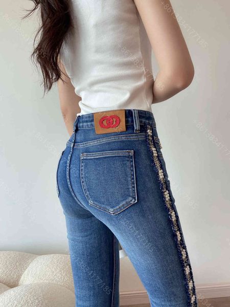 fashion womens jeans cc nail bead lace designer clothes pencil pants badge letter logo loose female high-quality casual pencil pants women c, Blue
fashion womens jeans cc nail bead lace designer clothes pencil pants badge letter logo loose female high-quality casual pencil pants women c, Blue