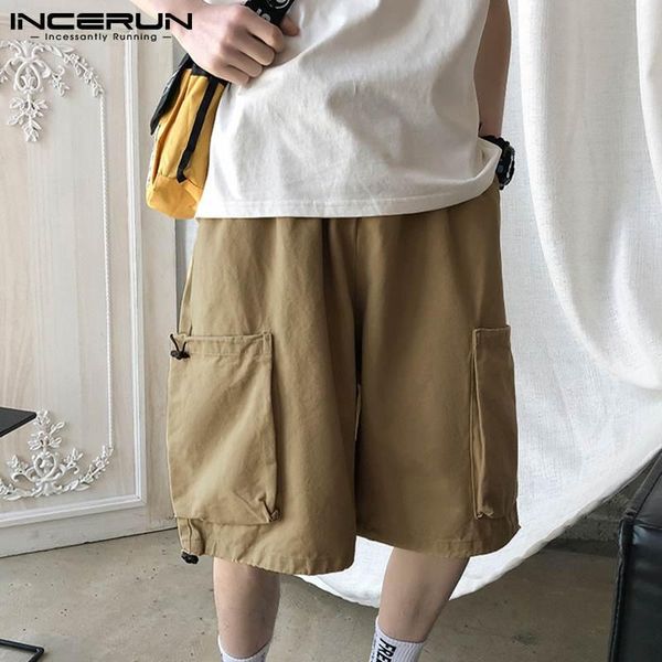 men's shorts incerun 2021 men casual solid color drawstring pockets streetwear summer fashion cargo korean loose bottoms, White;black
men's shorts incerun 2021 men casual solid color drawstring pockets streetwear summer fashion cargo korean loose bottoms, White;black