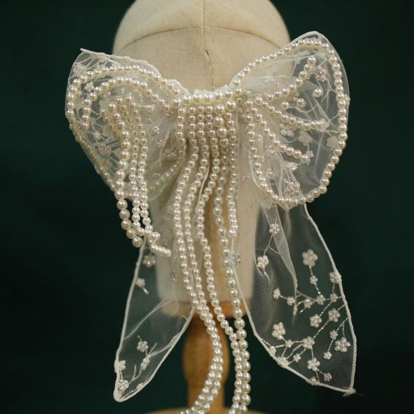 headpieces pearl tassel exaggerated french bow hairpin headdress bride wedding dress accessories, Silver
headpieces pearl tassel exaggerated french bow hairpin headdress bride wedding dress accessories, Silver