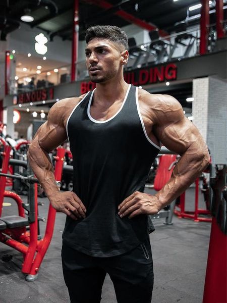 men' tank gym clothing cotton bodybuilding stringer men fitness singlets sport sleeveless shirt solid muscle vest undershirt, White;black 
men' tank gym clothing cotton bodybuilding stringer men fitness singlets sport sleeveless shirt solid muscle vest undershirt, White;black
